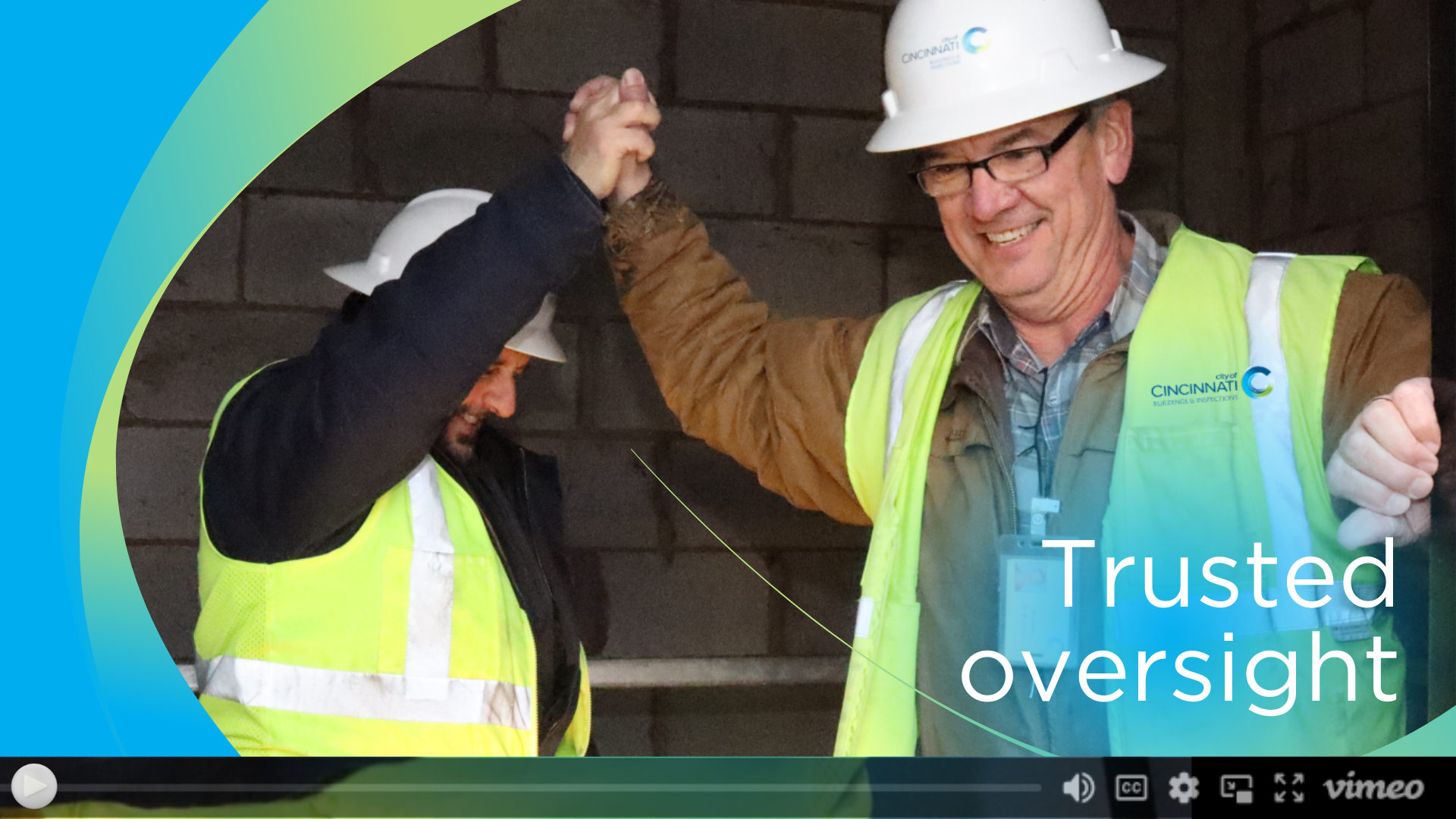 Vimeo Video link of two building and inspections employees giving one another high fives. The photo reads Trusted Oversight