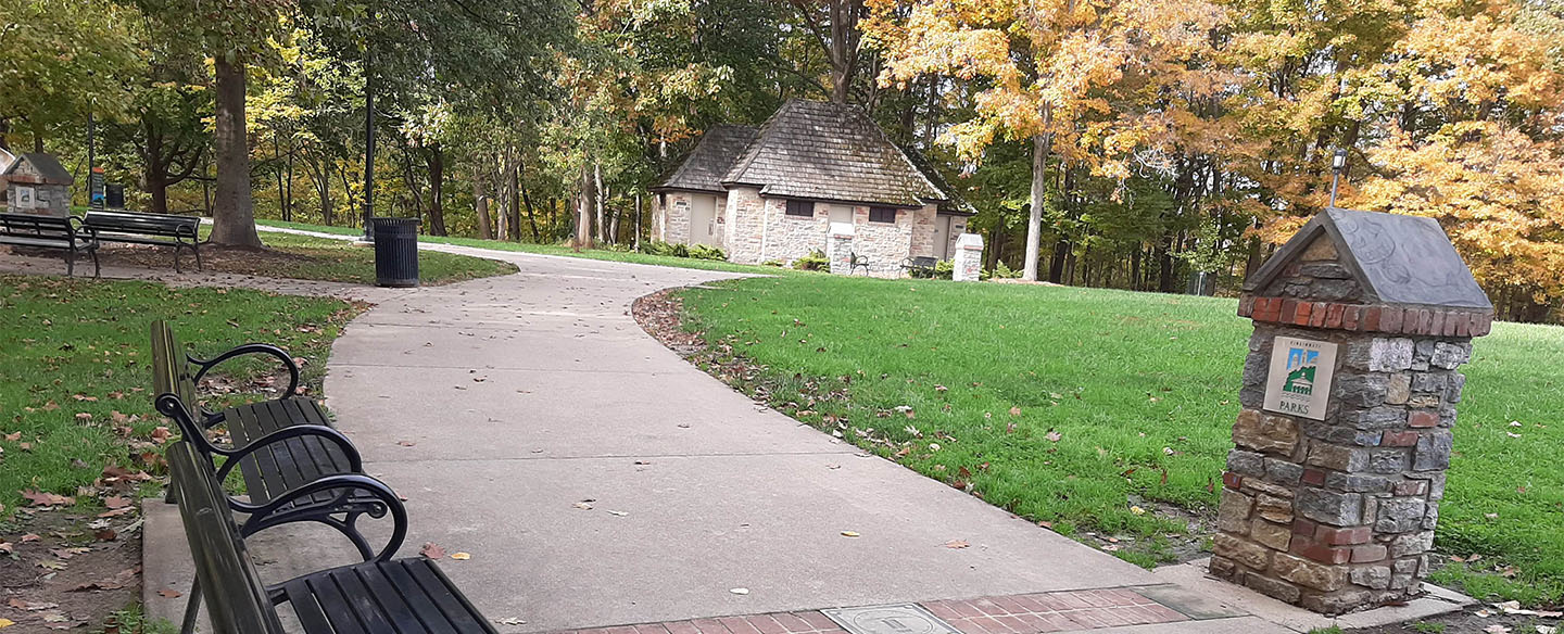 Bench and Paved Walking Path at Stanbery Park