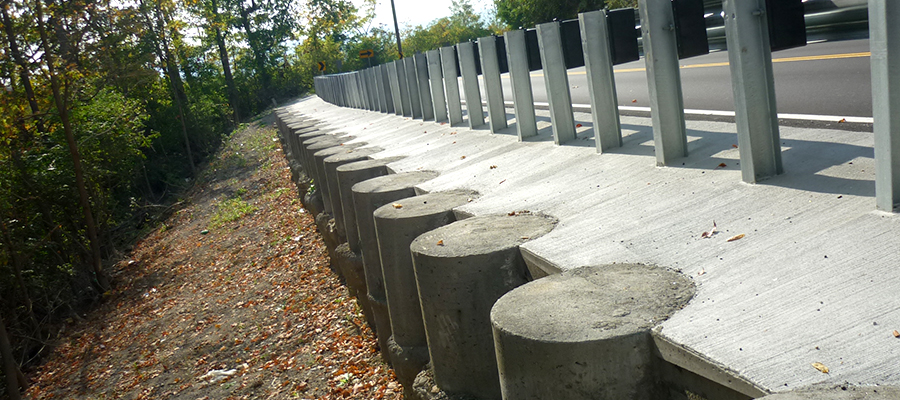 Retaining wall stabilizes a roadway