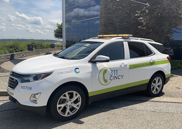 Picture of a Community Responder vehicle with green reflective striping and amber warning lights